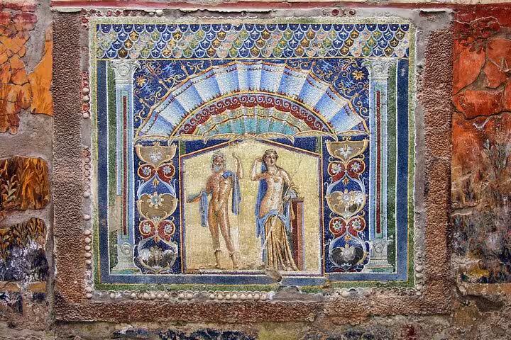 Intricate Roman mosaic artwork in Herculaneum, depicting vibrant colors and detailed craftsmanship.