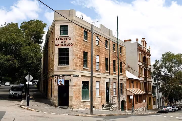 Historic sandstone Hero of Waterloo pub on street corner in Sydney, a stop on haunted ghost tours