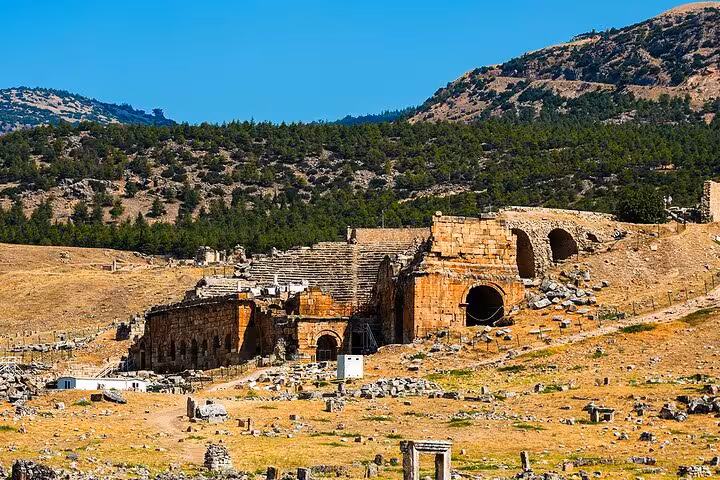 Ancient Hierapolis theater ruins above Pamukkale, cultural highlight on 5 Days Ephesus Pamukkale Cappadocia Tour