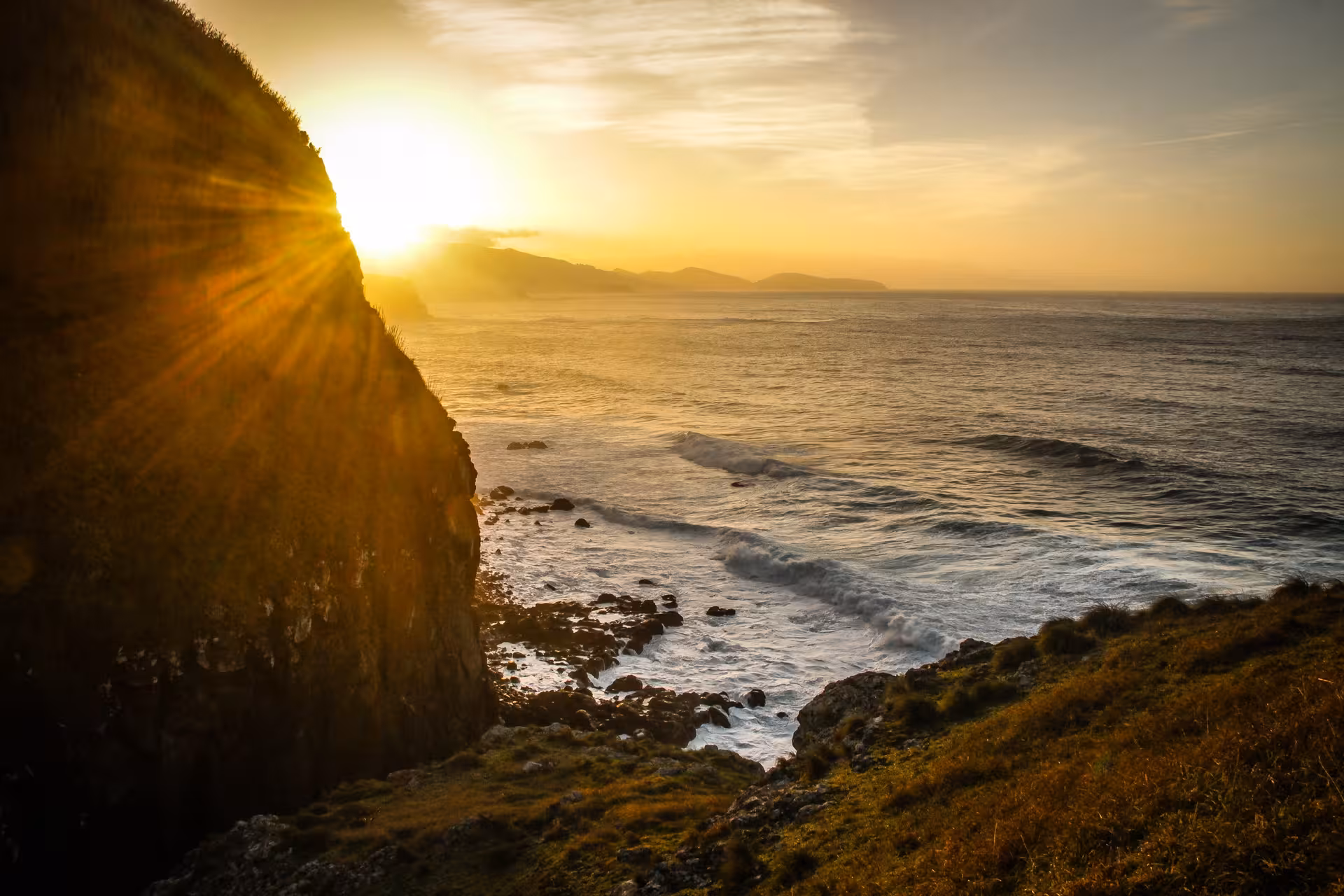 Sunset over São Miguel cliffs and Atlantic waves on the HIKE Ribeira Funda to Maia coastal trail