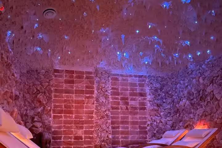 Himalayan salt cave room in Sharm El Sheikh with ambient lighting, featured in salt therapy and shopping experience