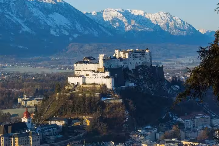 Hohensalzburg Fortress overlooking Salzburg with Alps backdrop, Salzburg private day tour from Vienna with guide