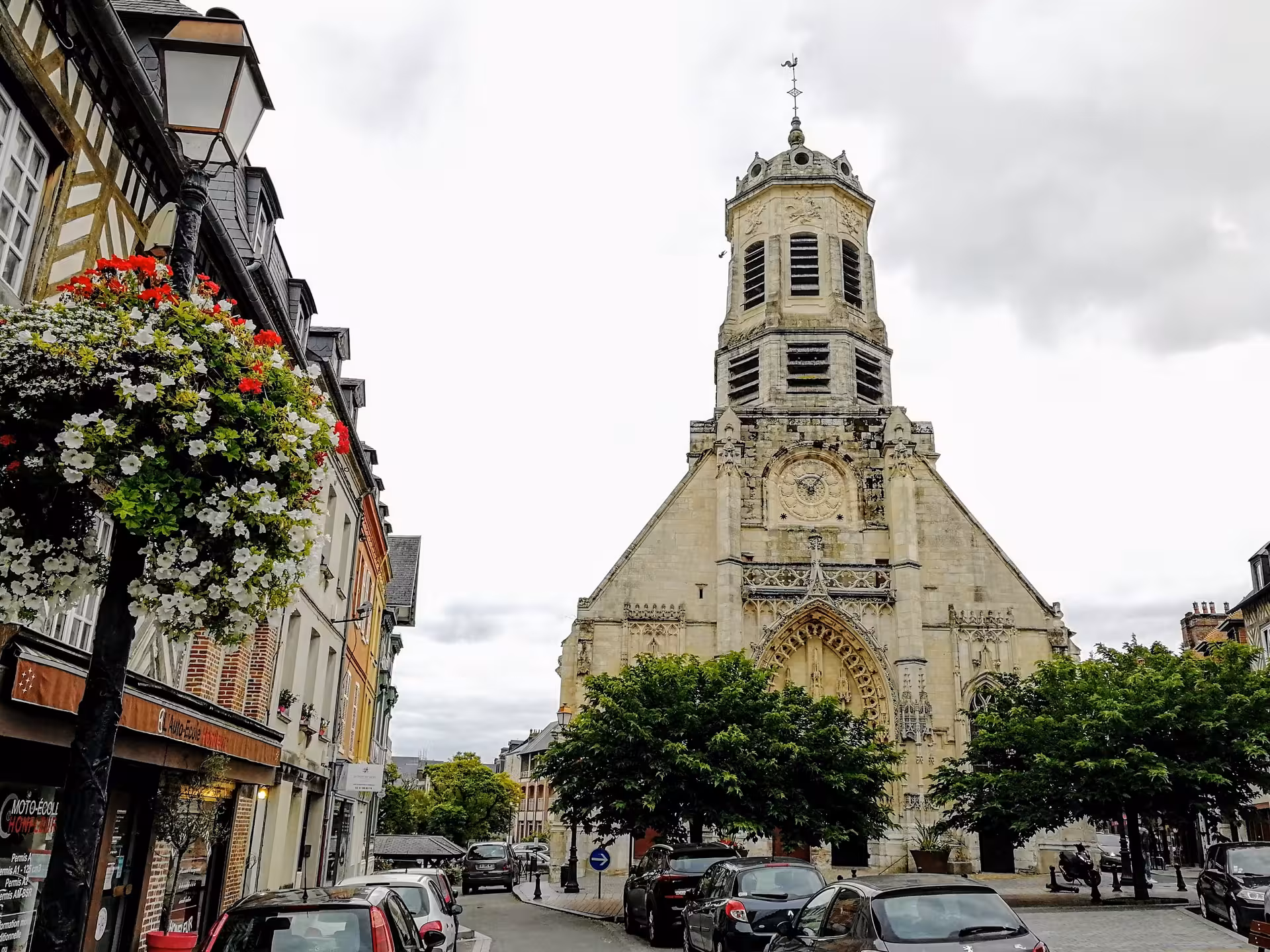 Sainte-Catherine church and old town street in Honfleur, stop on a guided electric bike tour in Normandy
