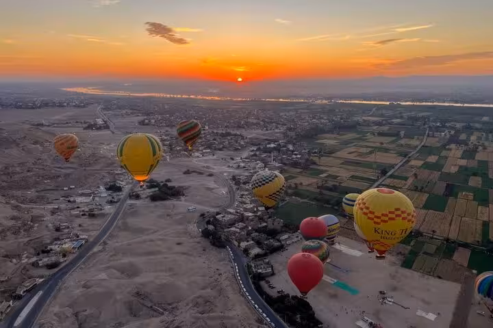 Sunrise hot air balloon ride over Luxor West Bank and Nile Valley, with hotel pickup and drop-off included