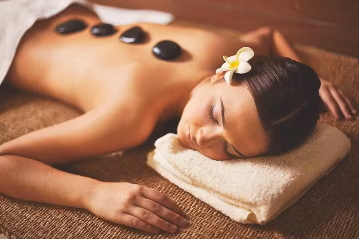 Hot stone back massage session at Luxor Hammam spa, 2-hour relaxation treatment with aromatherapy