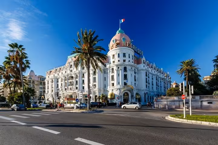 Hotel Negresco iconic Belle Époque facade with pink dome on the French Riviera in Nice, France
