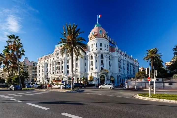 Hotel Negresco's iconic pink dome and white Belle Époque facade on Nice's Promenade des Anglais