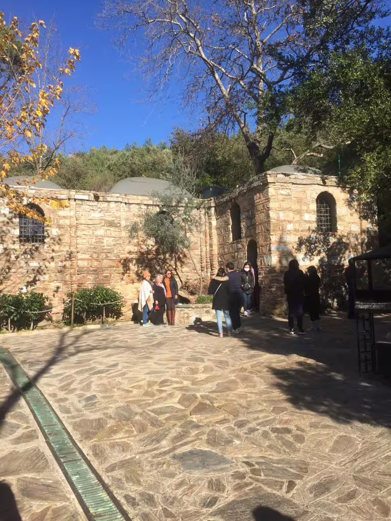 Visitors outside the House of Virgin Mary near Ephesus, Turkey on an all-inclusive private tour with lunch