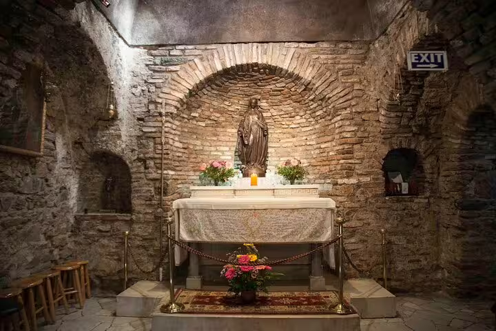 Visit the serene interior of the House of the Virgin Mary in Ephesus with a guided tour from Kusadasi, offering spiritual insights.