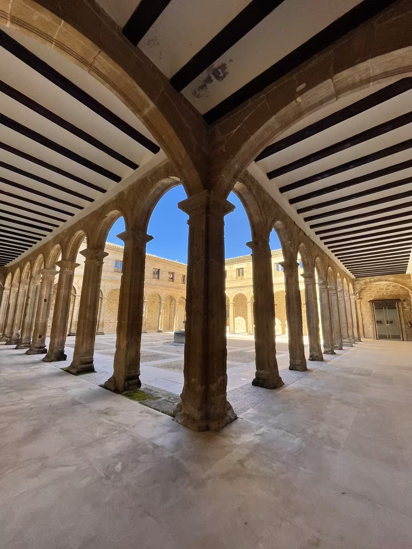 Stone arcade and columns in a medieval cloister, a highlight on the Guided tour of Huete Monumental