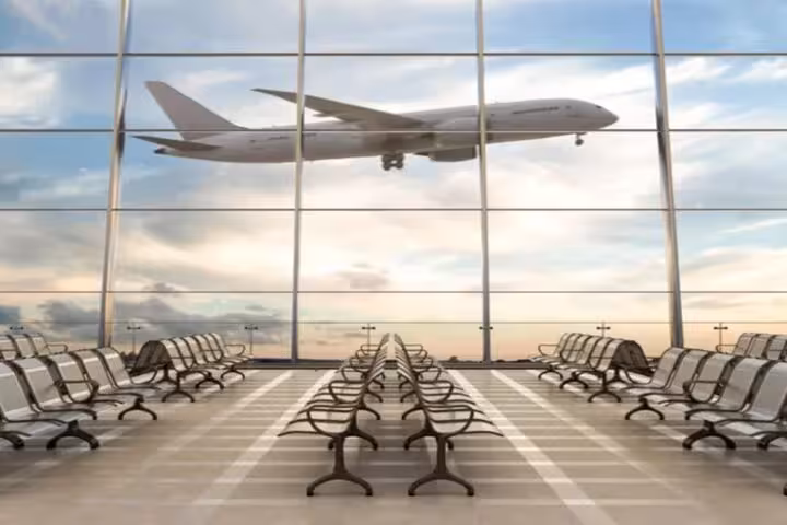 Airplane outside terminal window at Hurghada Airport, ideal for meet and greet private hotel transfer service
