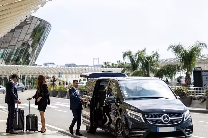 Hurghada Airport private minivan transfer with chauffeur greeting passengers for door-to-door ride