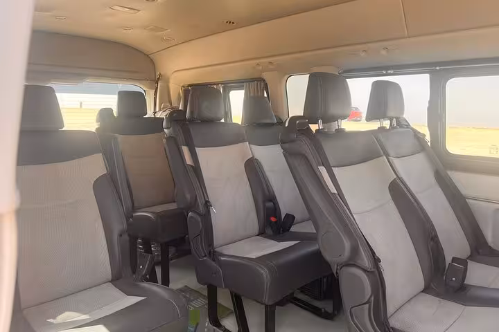 Air-conditioned minibus interior for Hurghada to Cairo transfer, comfortable seats for Giza Pyramids and GEM tour