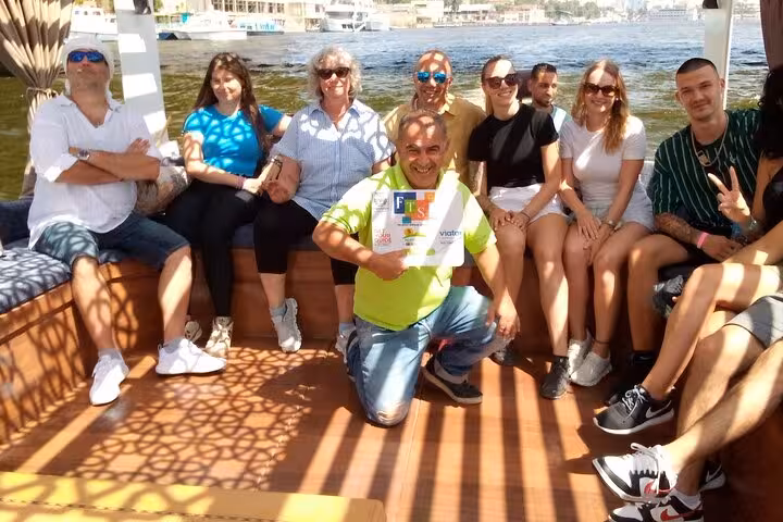Travel group on Nile boat in Cairo, Hurghada legacy trip including Giza Pyramids and Grand Egyptian Museum visit