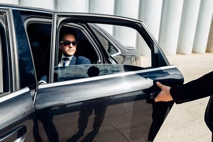 Chauffeur service with passenger in sedan for Hurghada to Cairo one way private hotel transfer in Egypt