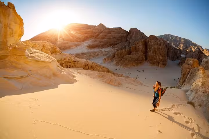 Wide desert canyon sunset view on Hurghada jeep safari adventure, ideal for stargazing and Bedouin dinner stop