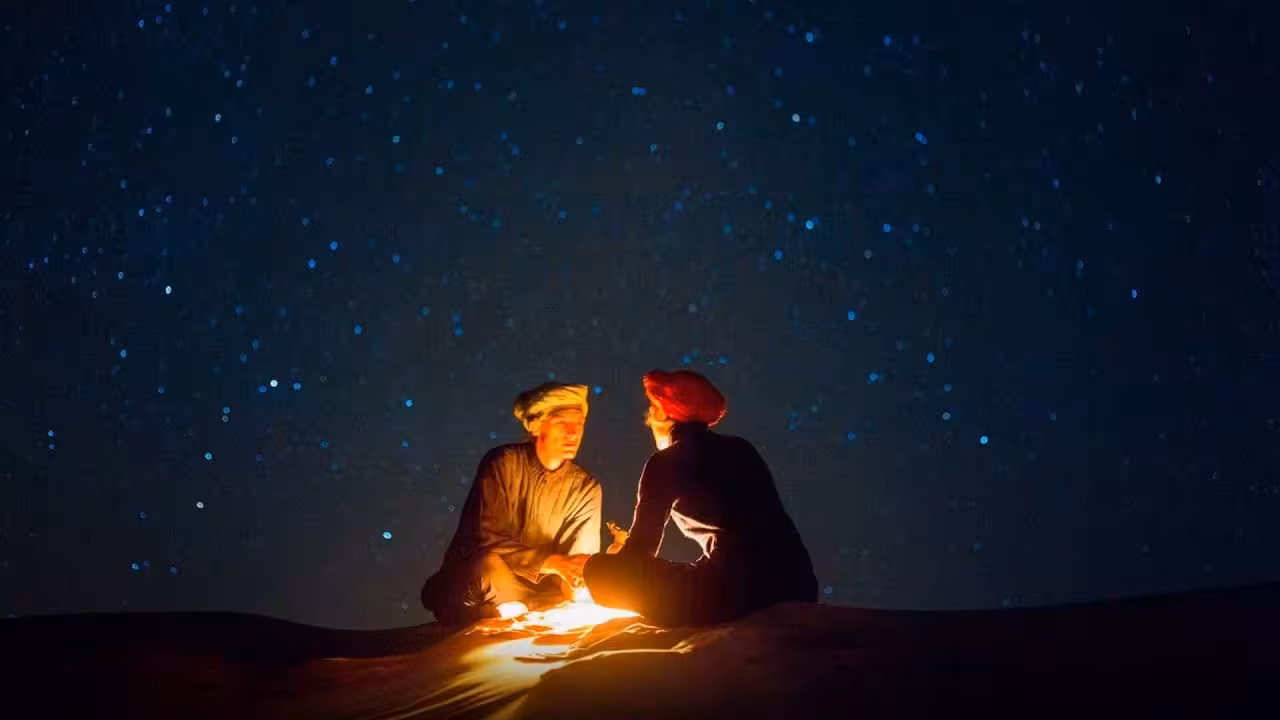 Bedouin campfire under starry Hurghada desert sky on jeep safari, with dinner and stargazing experience