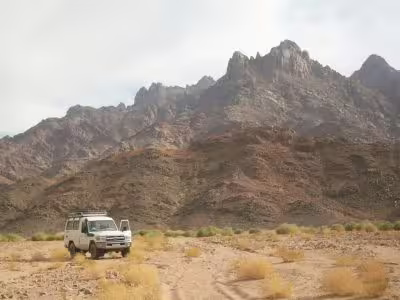 4x4 jeep driving through Hurghada desert mountains on an Eastern Desert safari tour with scenic rocky landscape