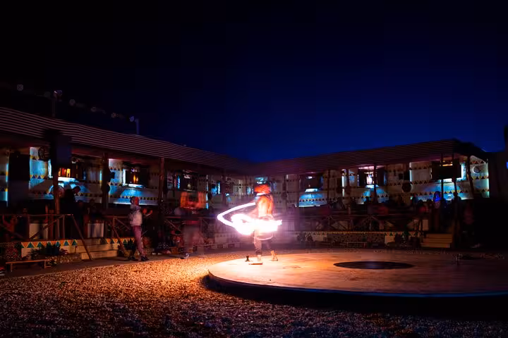 Tanoura-style spinning light show at Hurghada desert safari dinner camp after quad bike ATV ride