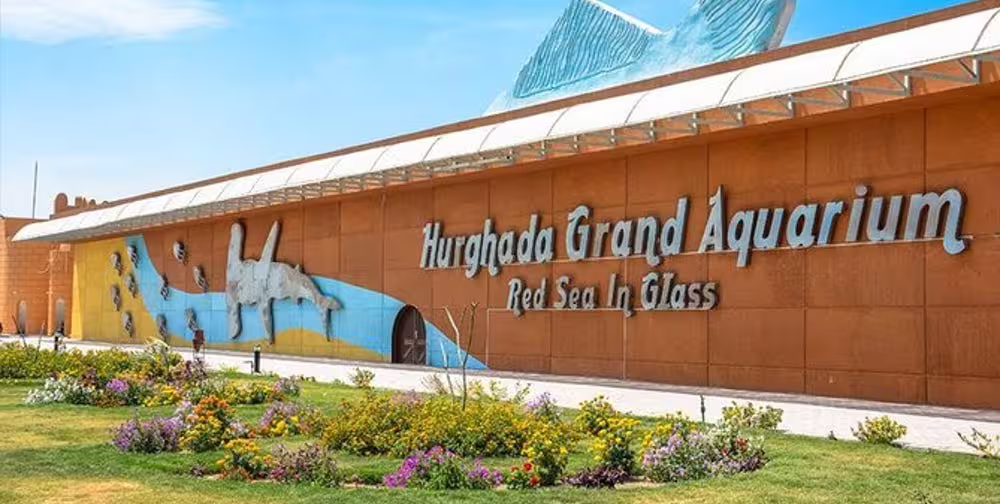 Exterior of Hurghada Grand Aquarium entrance, Red Sea in Glass signage, popular Hurghada attraction and tour