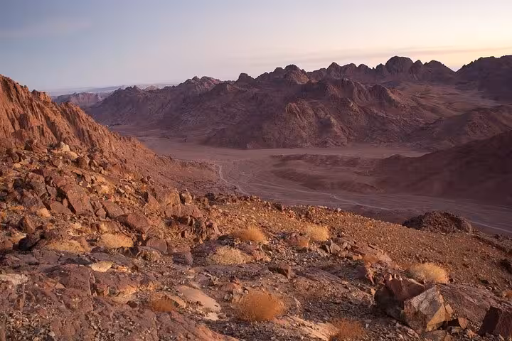 Sunset over Red Sea desert mountains near Hurghada on Jeep safari stargazing adventure with Bedouin dinner