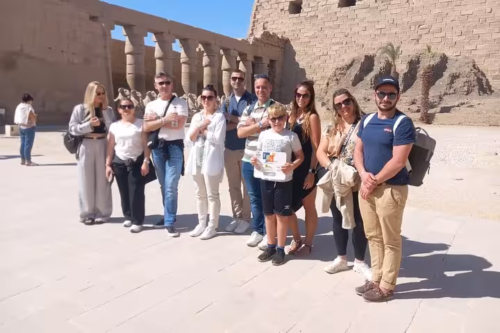 Group photo at Karnak Temple, Luxor on Hurghada Valley of the Kings tour with Tutankhamun Tomb visit