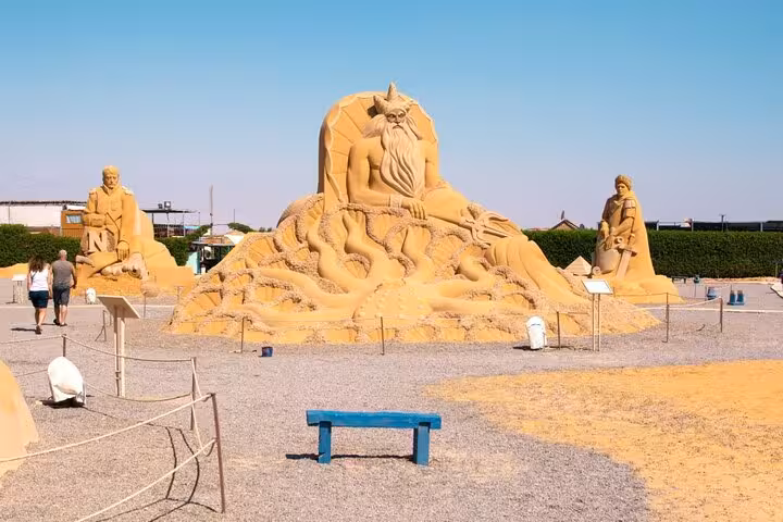 Hurghada Sand City Poseidon sand sculpture with visitors, included tickets and private transfer tour
