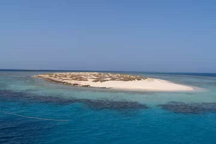 Sandbar island and coral reef lagoon near Hurghada, Red Sea stop on snorkeling day trip from Luxor