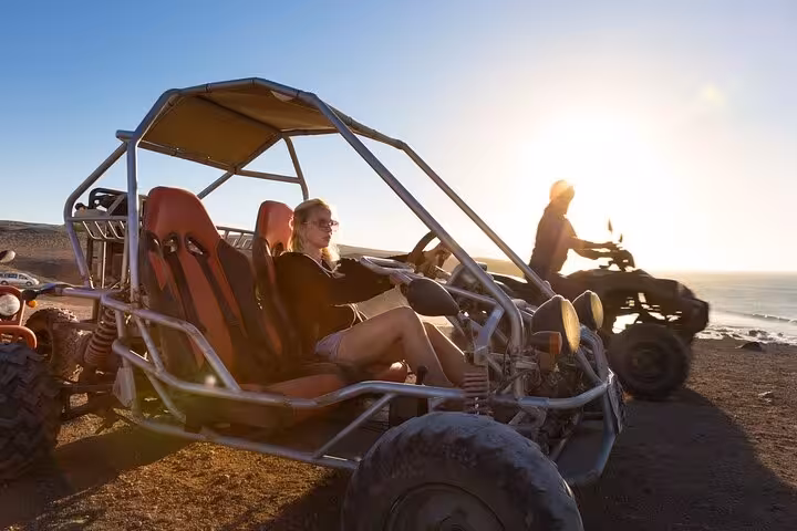 Sunset dune buggy ride in Hurghada with Red Sea views, off-road desert adventure near mountains and coast