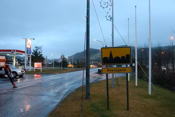 Hveragerði town entrance sign on the Golden Circle route, Iceland, with N1 gas station in background