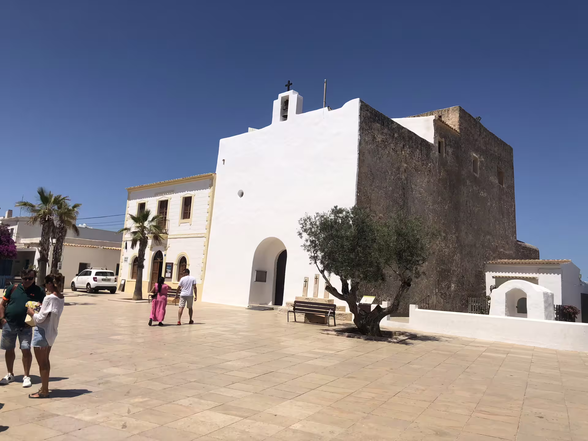 Whitewashed church in Formentera village stop on Ibiza to Formentera day trip by bike with ferry transfer