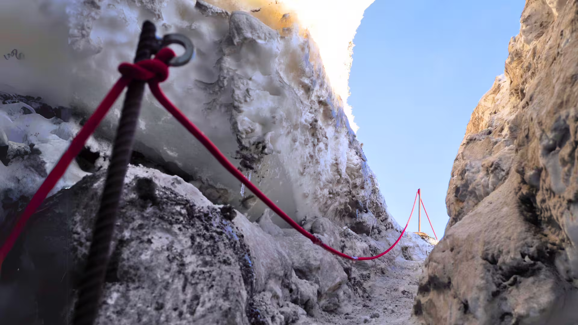 Safety rope and ice axe on Langjökull glacier route for Ice Cave and Glacier Monster Truck tour from Gullfoss