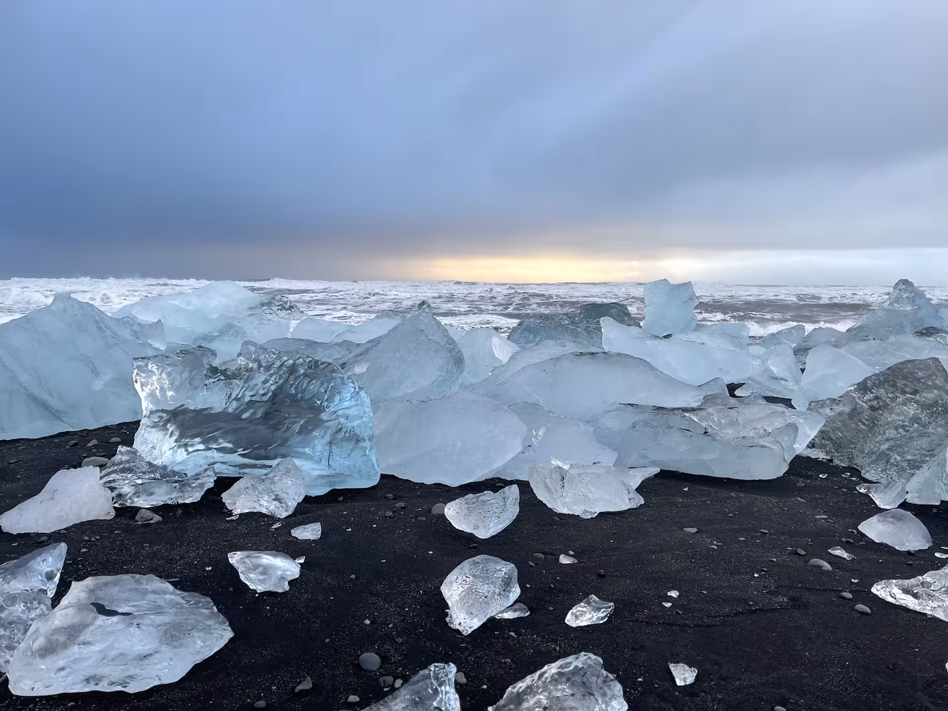 Glistening ice chunks on Iceland's Diamond Beach during a women-only summer Ring Road adventure.