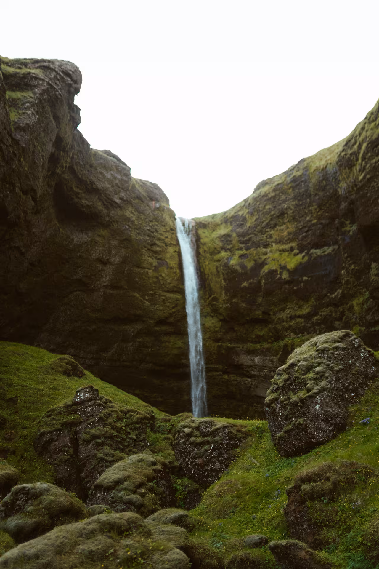 Mossy canyon waterfall on Iceland South Coast stop before Sólheimajökull glacier hike adventure