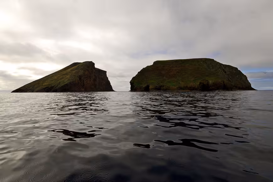 Ilhéus das Cabras islets off Terceira seen from the water, scenic stop on a 2-hour snorkeling tour