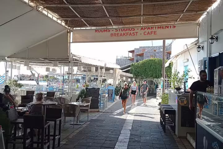 Bustling cafe and dining area near Imbros Gorge, ideal spot to relax before or after the private hiking tour.