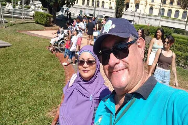 Visitors enjoying a sunny day at Ipiranga Museum gardens, a key attraction in Brazil's historical tours.