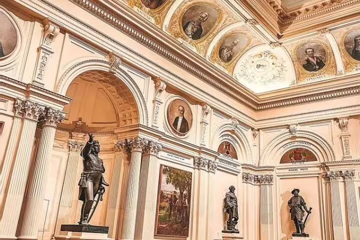 Interior of Ipiranga Museum showcasing ornate architecture and historical statues in Brazil.