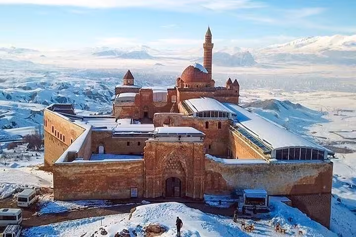 Snowy Ishak Pasha Palace in Dogubeyazit, Turkey, on an all-inclusive private guided city tour
