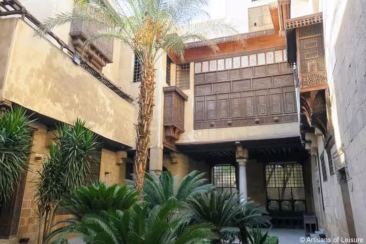 Traditional Islamic Cairo courtyard house with mashrabiya windows, seen on Historic Islamic Cairo walking tour
