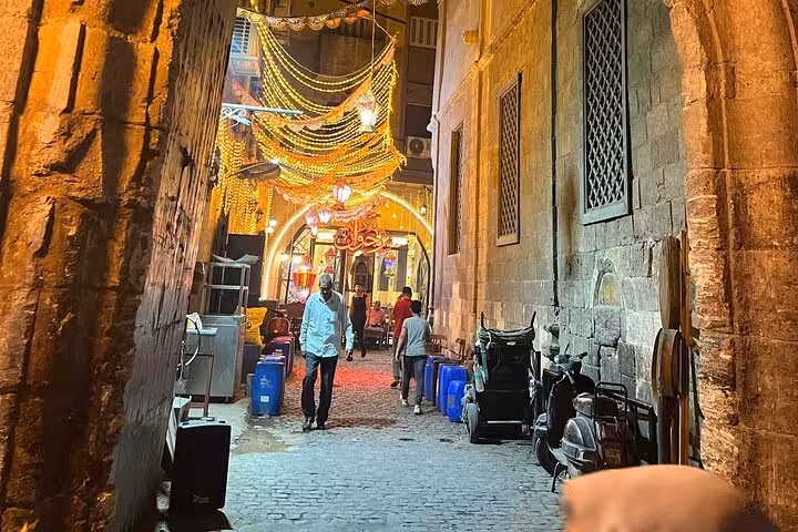 Lantern-lit alley in Islamic Cairo near Khan el-Khalili, a hidden gems walking tour with local culture