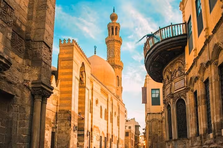 Mosque dome and minaret on a Historic Islamic Cairo walking tour through medieval streets and bazaars