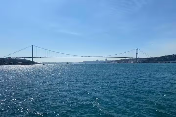 Bosphorus Strait cruise view of Istanbul’s suspension bridge, included in 6-day Istanbul tour with flights