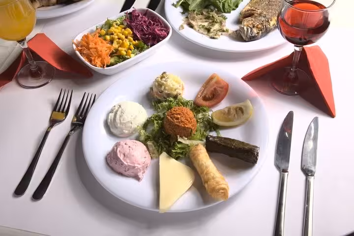 Turkish mezze starter plate served at private table on Istanbul Bosphorus dinner cruise Turkish night