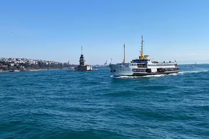 Istanbul Bosphorus ferry passing Maiden’s Tower, scenic start of 8-day mini group Turkey tour