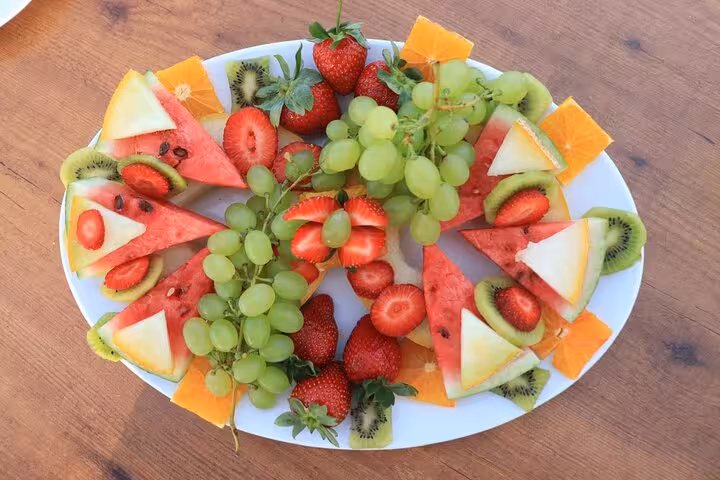 Fresh fruit platter served on a luxury yacht during an Istanbul Bosphorus sunset cruise experience