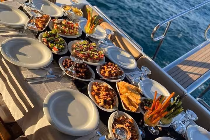 Turkish mezze and drinks served on deck during a private Istanbul Bosphorus yacht cruise experience