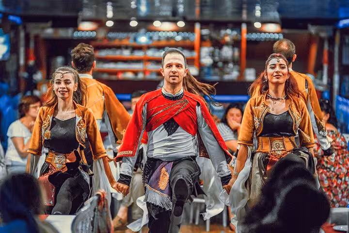 Traditional Turkish folk dance show onboard Istanbul New Year’s Eve party cruise with live entertainment and dinner