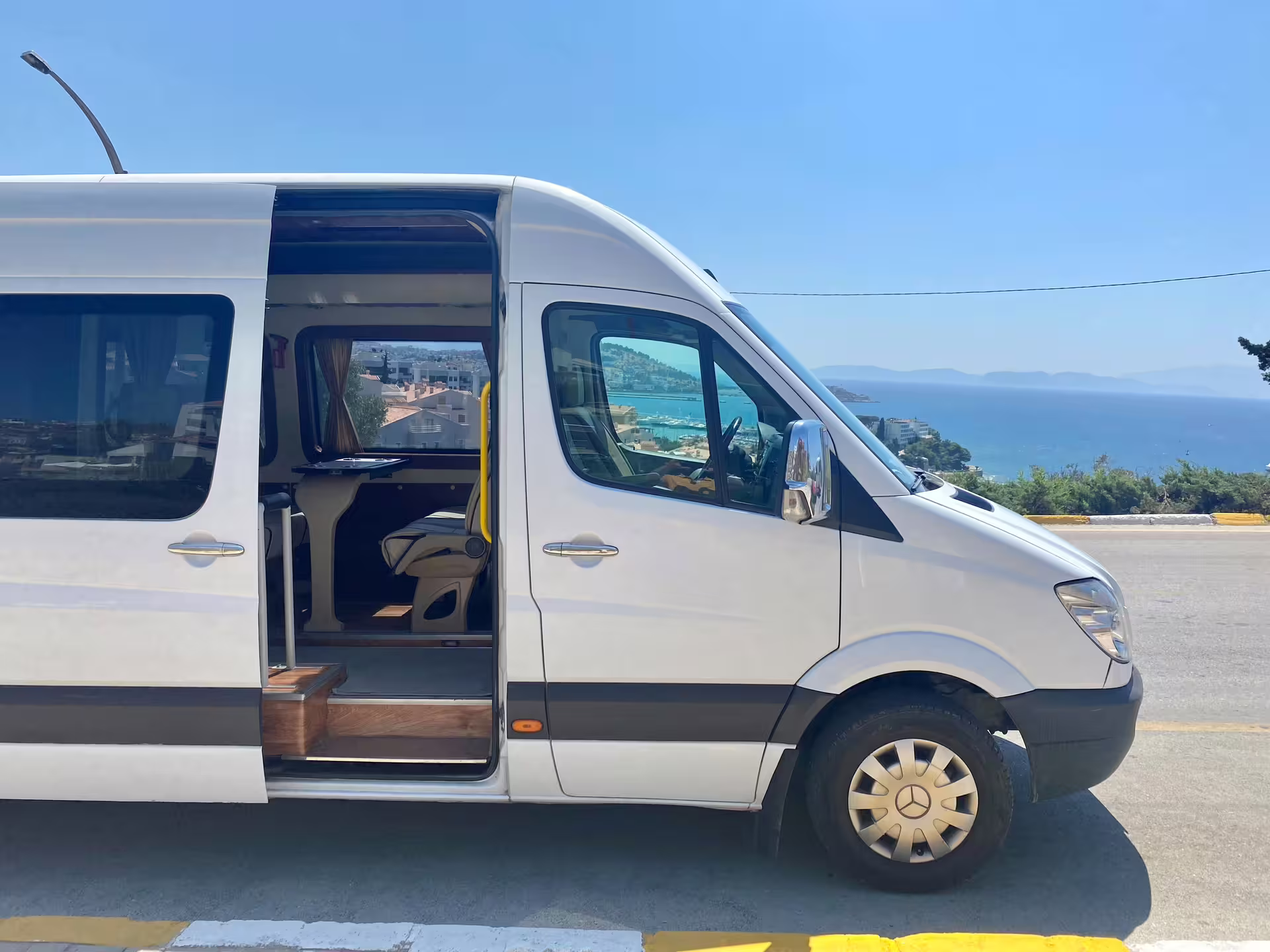 Private tour minivan with open door for hotel pickup in Istanbul, comfortable transport for full-day guided tour