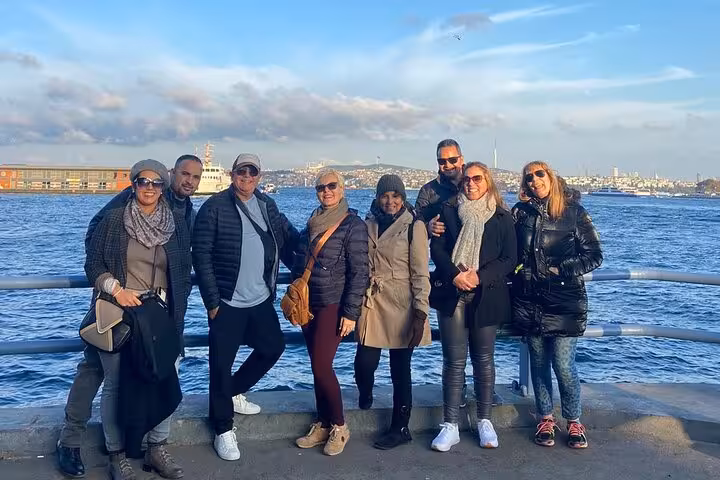Private Istanbul shore excursion group photo by the Bosphorus near Istanbul Port with skyline views